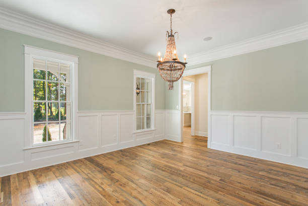 istock Bright Dining Room with Double Doors, Chandelier, and Natural Light Coming In 2159385935