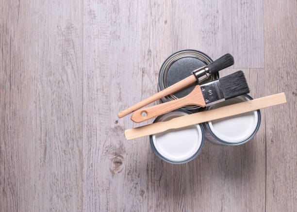 istock Cans of paint with paintbrushes, top view. 2159393337