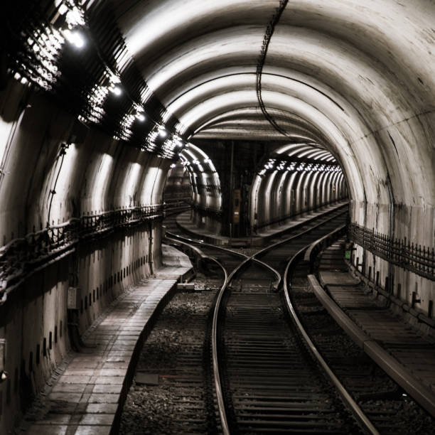 istock low key view into a subway tunnel with a nearby switch 2159395156
