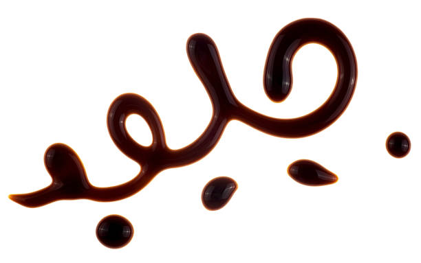 istock Drops of balsamic vinegar isolated on a white background, top view. Balsamic vinegar cream, Italian salad dressing. 2159395239