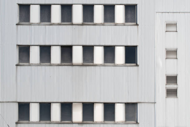 istock Partial view of a modern exterior facade with windows 2159395338