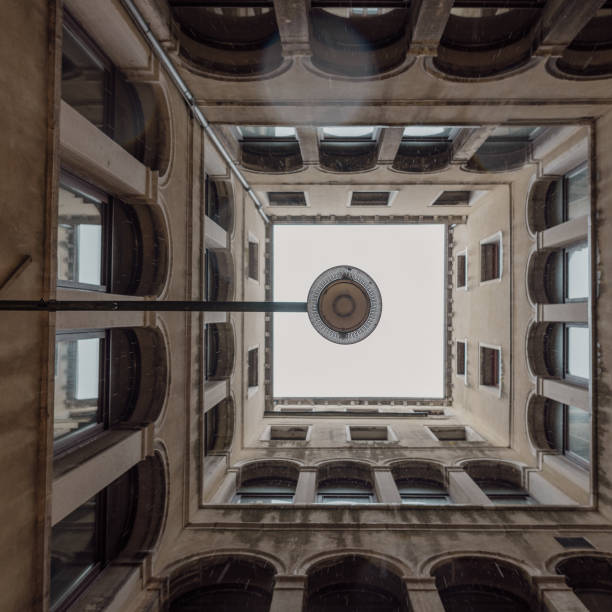 istock View to the sky in a Venetian courtyard with lamp 2159395514