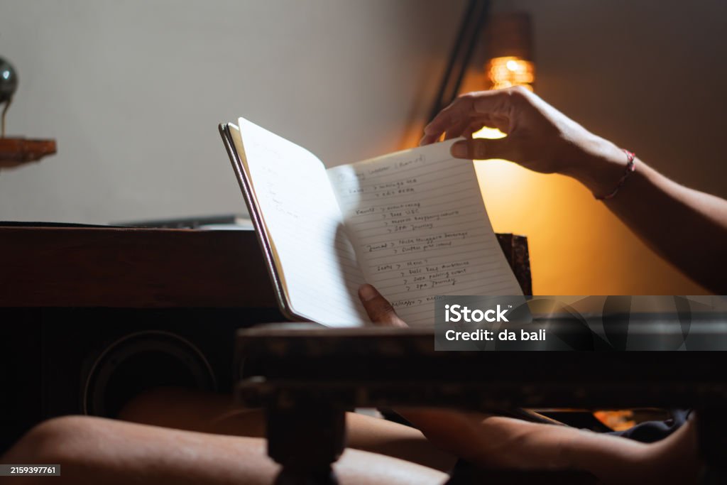 Read Note Image Person Reading Handwritten Notes In A Notebook Stock Photo - Download ...