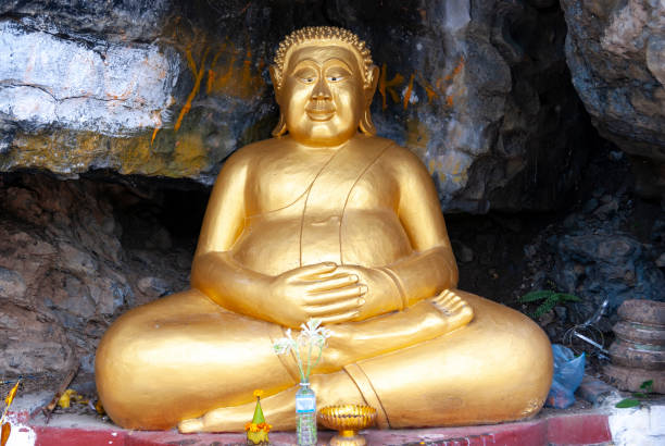 Chom Si Temple, located atop Mount Phousi in Luang Prabang, Laos, is a significant historical and religious site. The temple is renowned for its striking golden stupa, which stands out against the lush green backdrop of the hill. Visitors often climb the steps to reach the temple, where they can enjoy stunning views of the surrounding city and landscapes. The serene atmosphere and beautiful architecture make Chom Si Temple a popular destination for tourists and pilgrims alike.