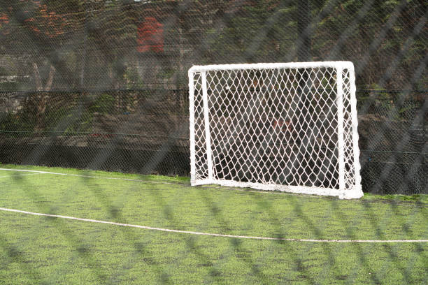 istock Empty soccer goal on artificial turf field 2159401560