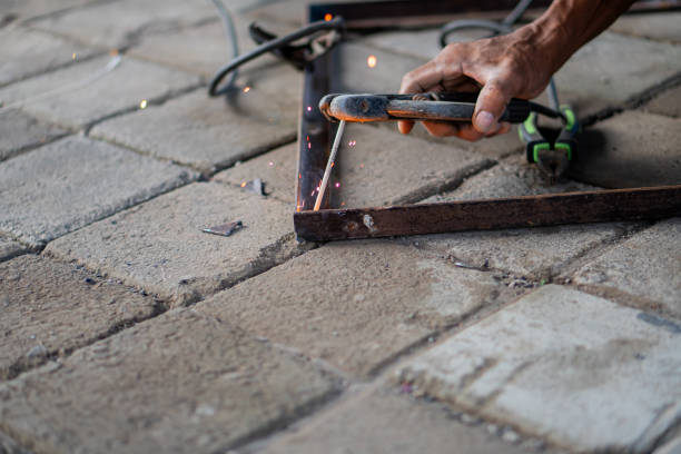 istock Close-up of welding metal rods on a paved surface 2159402429