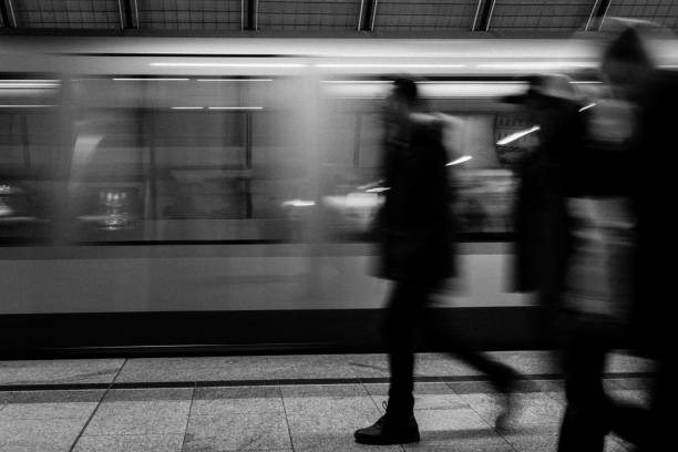 abstract blurred shot of people in a subway station
