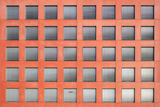 minimalist monotonous exterior facade with closed blinds of a modern architecture