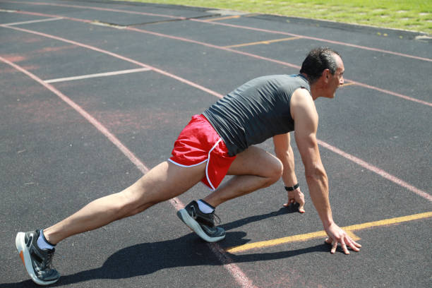 istock The Body Of A Professional Runner Stretching 2159403186