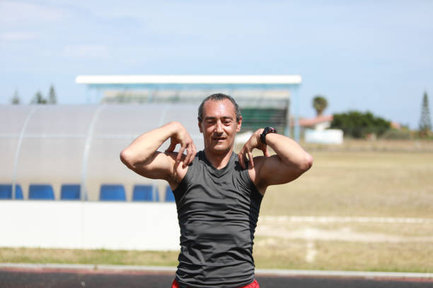 istock Sweating And Stretching Athlete At The Stadium 2159403831