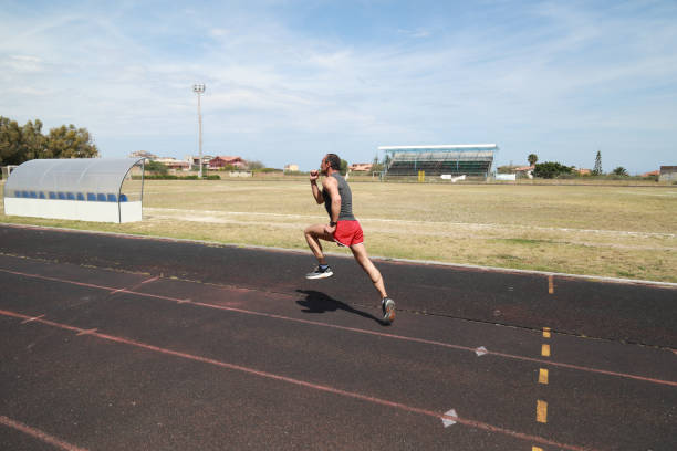 istock The Runner Sprint In The Athletic Track 2159404143