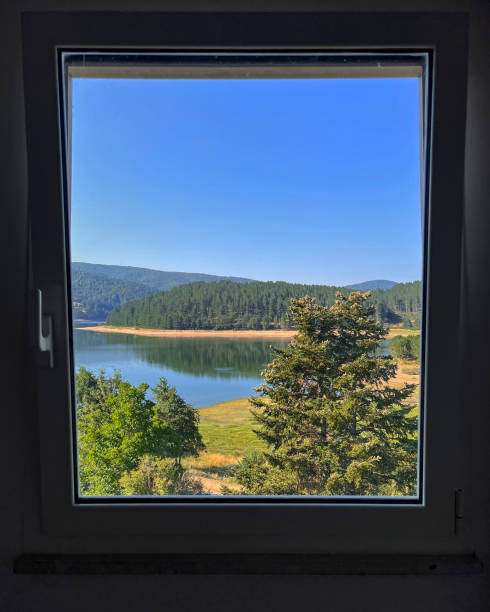 View of a vast body of water through a window