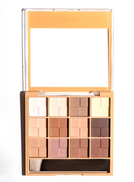 istock Set of nude eyeshadows in beige case on white background. Top view , copy space. Make up 2159408423