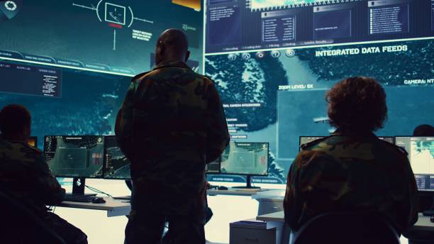 istock Commander and his crew operating radar systems via CCTV and satellite 2159421787