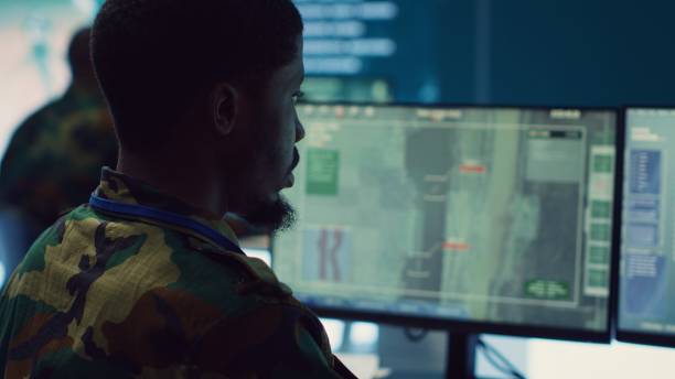 istock Soldier implements and processes tactical data with reconnaissance radar system 2159422968
