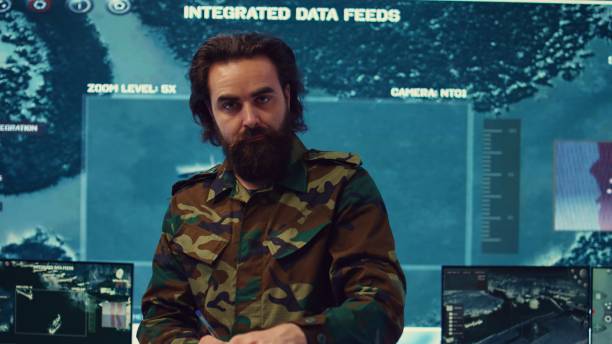 istock Officer analyzes intelligence reports to anticipate enemy movements 2159423395