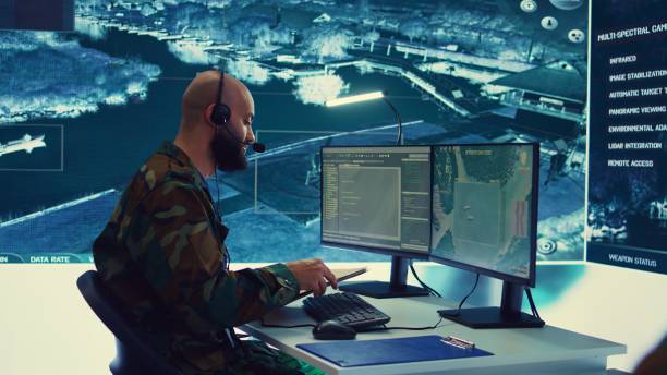 istock Military operator transmitting gps coordinates of hostile ships to national guard 2159424828