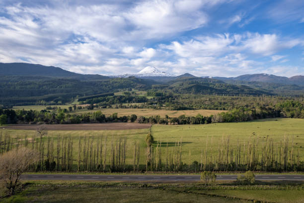 Aerial view of agricultural fields on the feet of Llaima volcano in La Araucania regionm southern Chile
