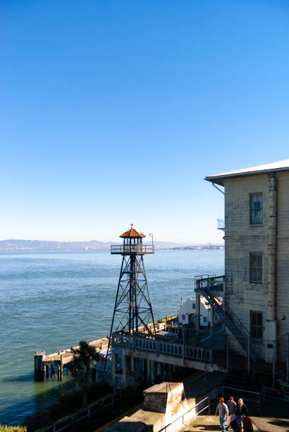 Buildings, pier and watchtower of the maximum security federal prison of Alcatraz in San Francisco Bay, in the state of California, United States of America. USA Concept.