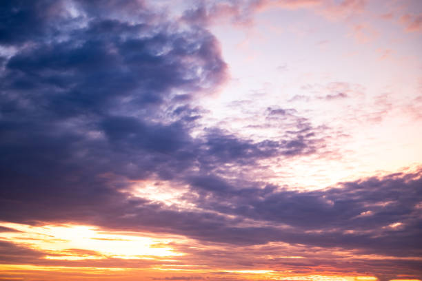 istock Beautiful , luxury soft gradient orange gold clouds and sunlight on the blue sky perfect for the background, take in everning,Twilight, Large size, high definition landscape photo 2159427852