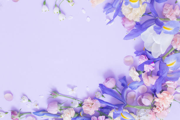 istock beautiful spring flowers on paper background 2159431785