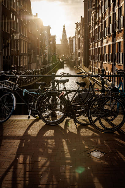 Bicycles parked on the bridge over the Amsterdam canal.