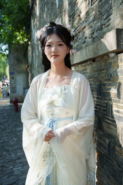 istock Young female tourist experiencing Hanfu 2159434027