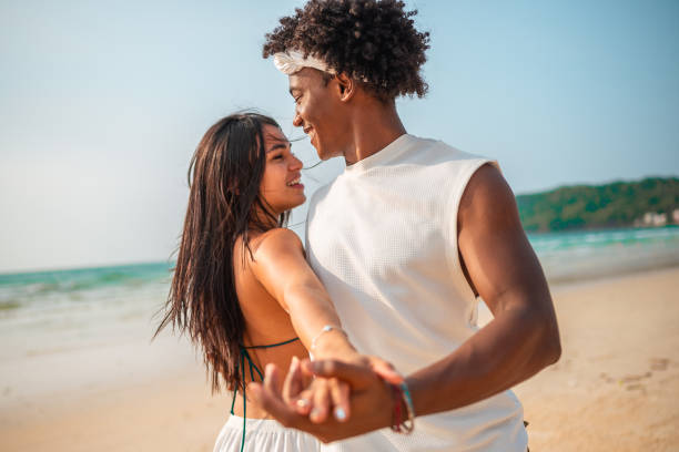 istock Joyful Interracial Couple at Seaside 2159438102