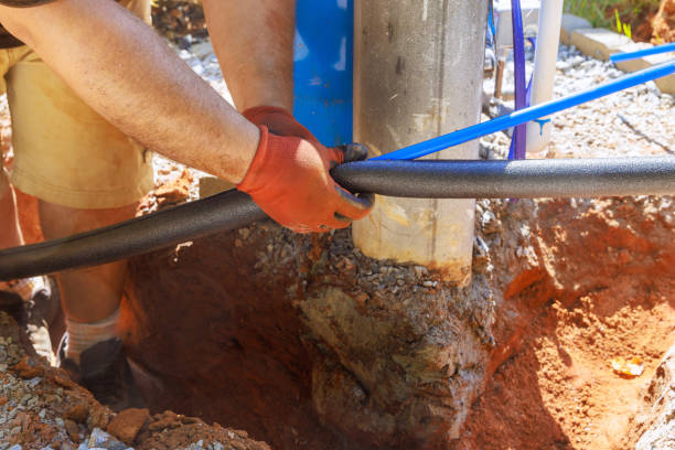 istock Plumber applied thermal insulation isolation to water pvc a pipe before installing it 2159440981