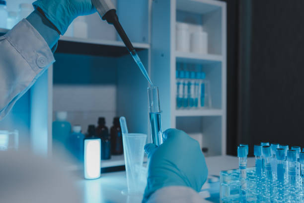 istock a scientist is working in a laboratory, a chemical researcher is preparing sample for a vaccine against a virus, work in lab concentrate is the most important because chemicals are dangerous 2159441242