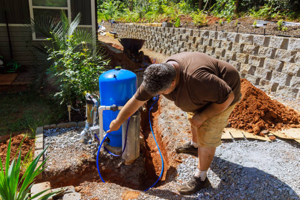 istock Pipes in trench are ready for connection to a home well water system 2159442429