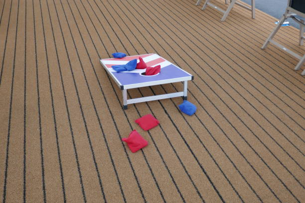 USA colors on cornhole game with red and blue beanbags on ship deck