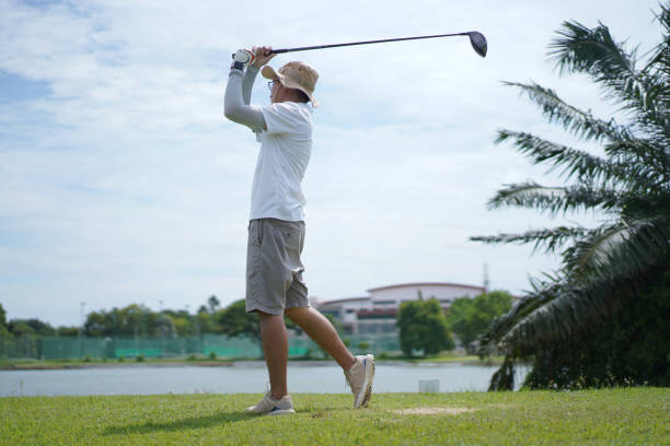 istock Asian man enjoy playing golf. 2159450282