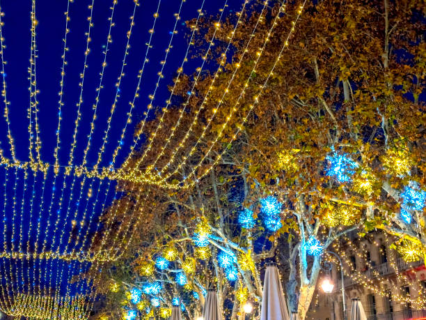 istock Shiny decorated Christmas market at night 2159453609