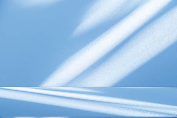 istock Wall interior background, studio, and backdrops show products. with shadow from window color white and blue light. background for text insertion and presentation of product 2159454031