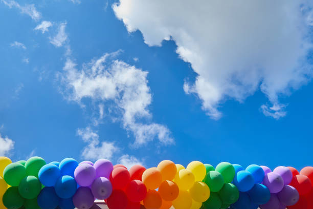 istock Colorful Balloons Under Blue Sky 2159458519
