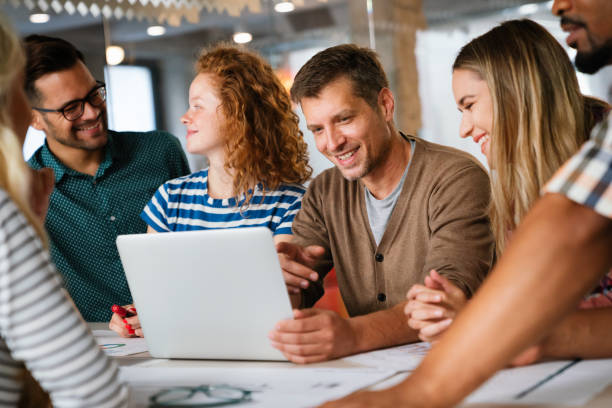 istock Collaborative process of multicultural skilled people during brainstorming meeting in office 2159462628