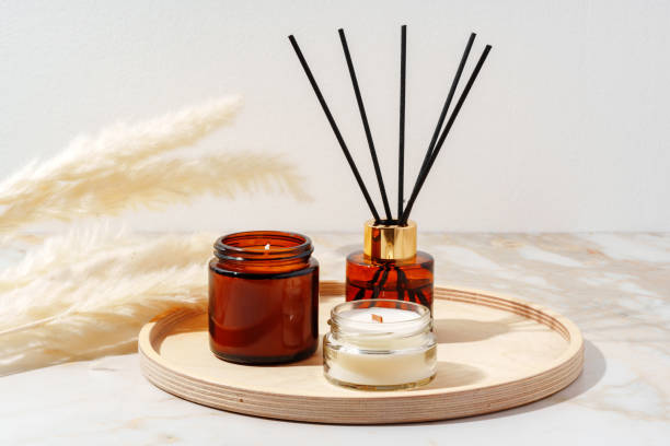istock Scented Candles and Reed Diffuser on a Wooden Tray 2159463722
