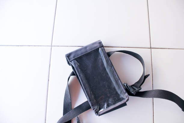 istock Waterproof cellphone holder on white floor 2159463859