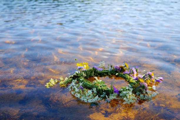 istock Flower Wreath on Water River. Ligo, Ivan Kupala. Midsummer Solstice Holiday concept 2159469005