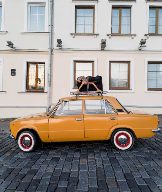 Minsk, Belarus, June 27, 2024 - Old vintage car on the streets. Retro automobile pakre on old city