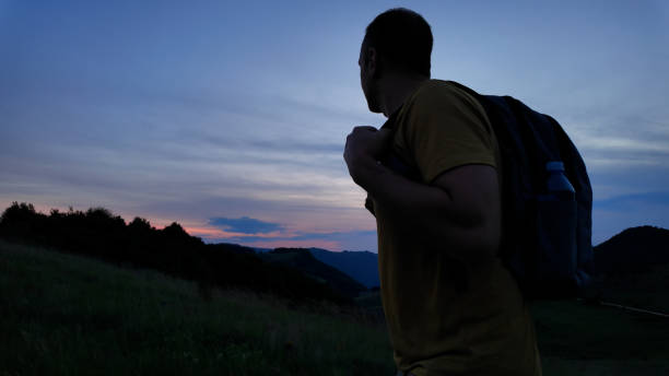istock Man walking in nature during blue hour time. 2159471055
