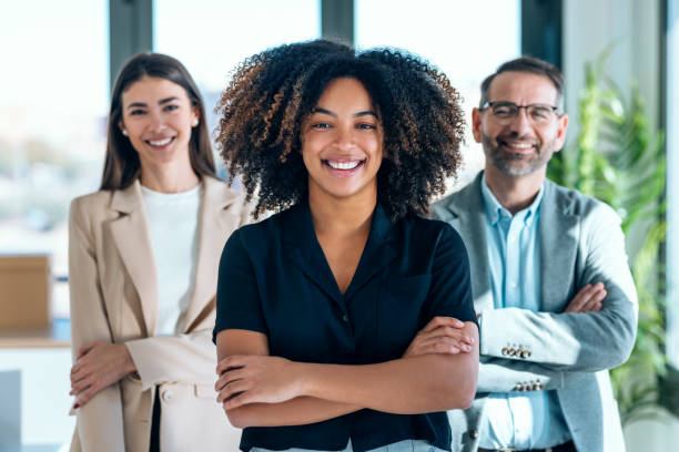 istock Successful business multiage team posing and looking at camera in modern startup. 2159472613