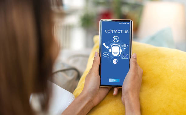 istock Human use smartphone with call center on screen contact us, email, address, operator, customer, suppor, phone services agen, customer support hotline.contact us concept 2159476221