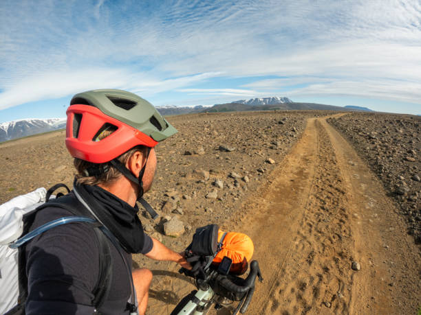 istock POV of cyclist on a backpacking trip in Iceland 2159477217