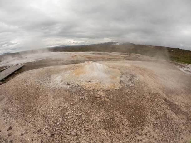 istock Steaming Geothermal Vent in Rocky Terrain 2159477261