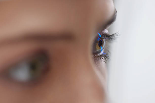 Eyesight Exam. Woman Checking Eye Vision On Optometry Equipment