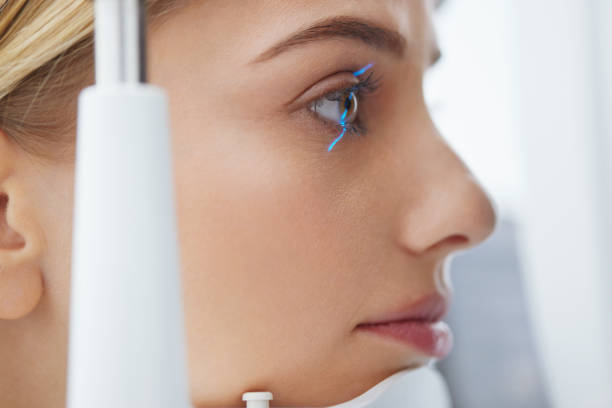 istock Eyesight Exam. Woman Checking Eye Vision On Optometry Equipment 2159482968