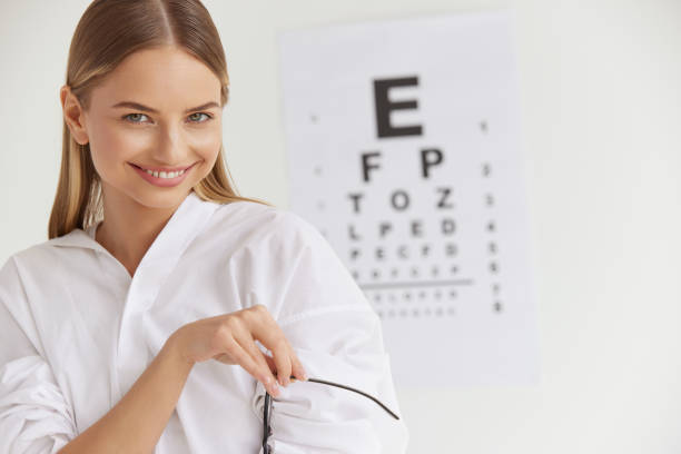 istock Optometry And Vision. Smiling Girl At Ophthalmologist Office 2159483045