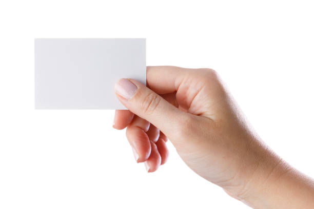 istock Woman's hand holding a business card 2159483729
